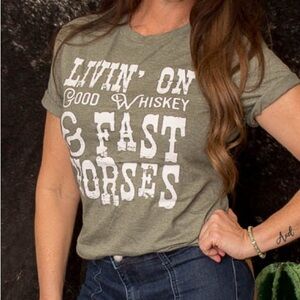 Green “Livin on good whiskey and fast horses” tee.